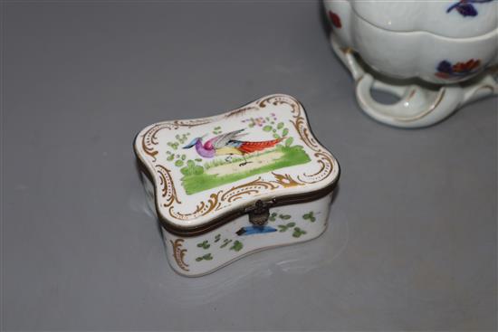 A Portuguese enamel box and cover and two other porcelain caskets, largest 13cm